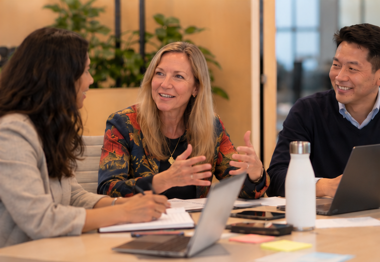 Amy Butler collaborating with two colleagues